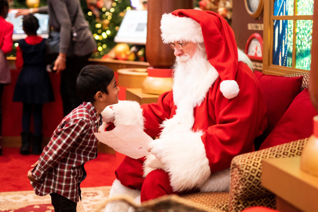 Santa at the mall with a child