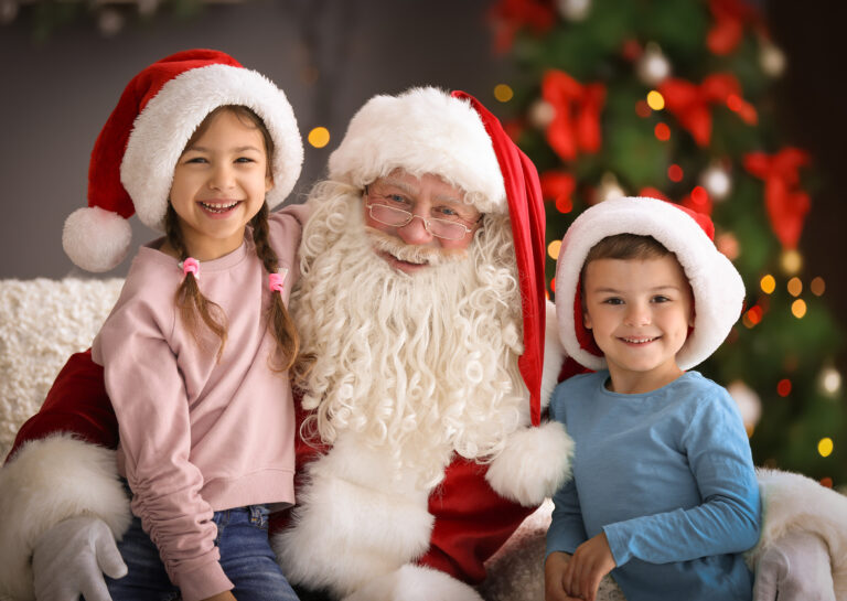 Santa with kids on his knees